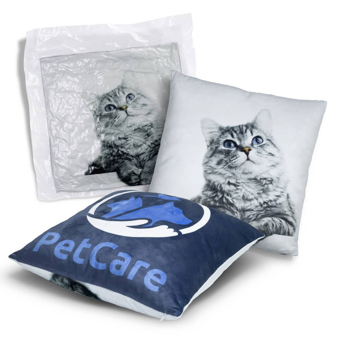 A plush cushion featuring a grey cat design and a blue PetCare logo, packaged in a clear plastic cover.