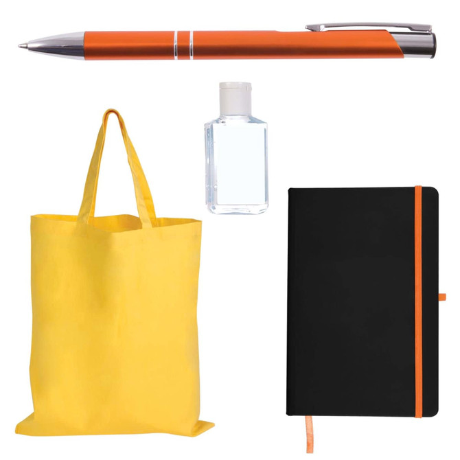 A pen with an orange accent, a small bottle, a yellow tote bag, and a black notebook with an orange elastic band.