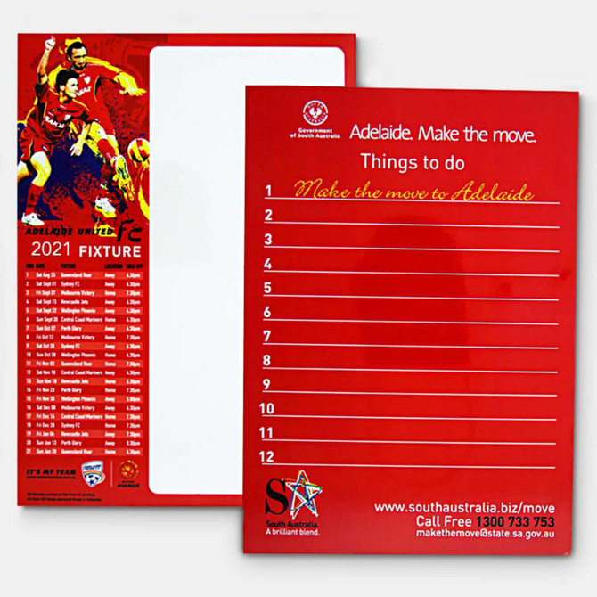 A red magnetic whiteboard with a blank section and a list titled "Things to do," featuring a logo.