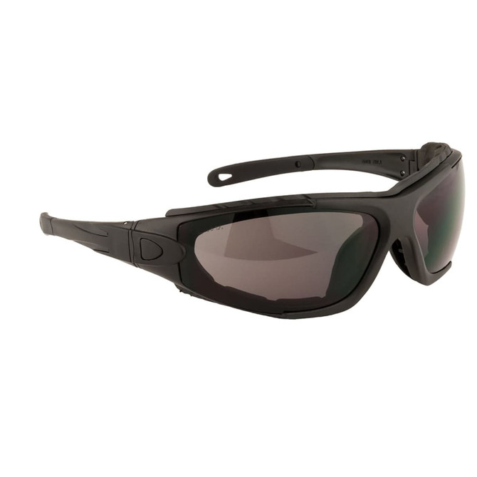 A pair of black safety spectacles with tinted lenses and a sleek design. The glasses have a logo on the side.
