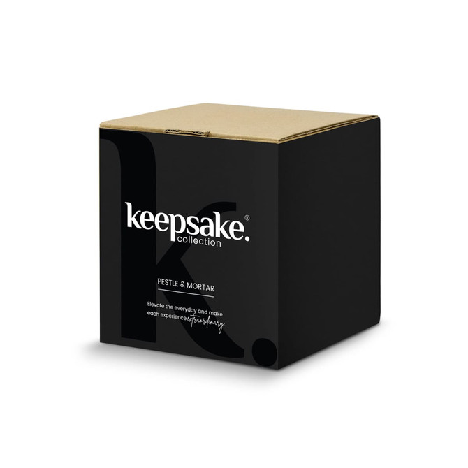 A black box packaging for a Keepsake mortar and pestle set with a logo on the front.