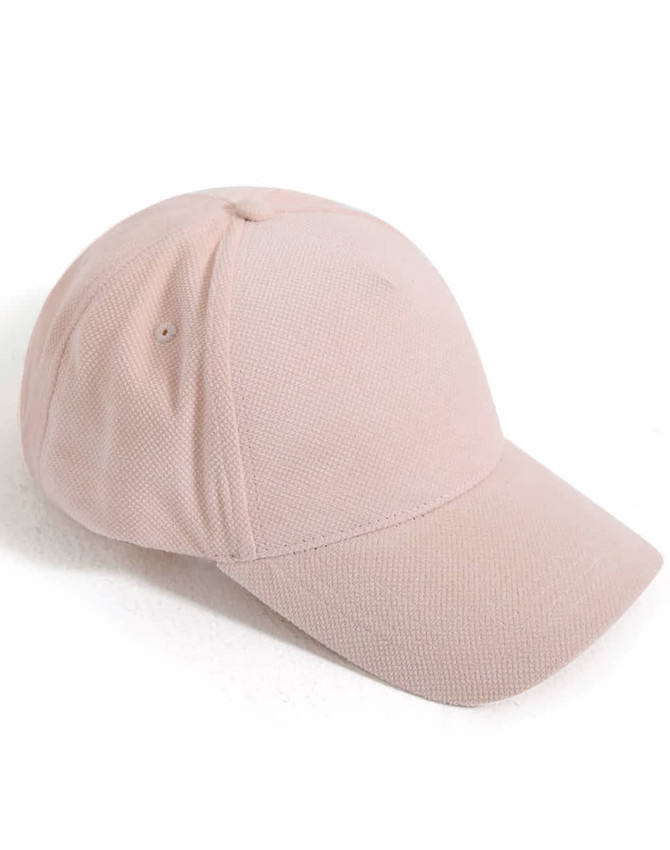 A pink jacquard texture five-panel cap with a rounded crown and a stiff brim, featuring a logo.