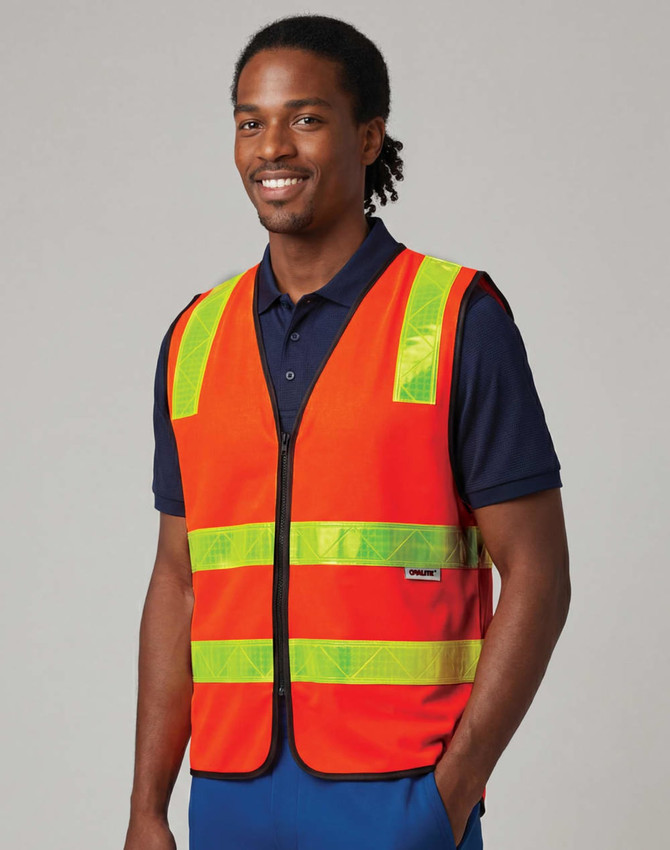 A high-visibility orange road safety vest with reflective yellow stripes, worn by a male model. Features a clasp front and branding.