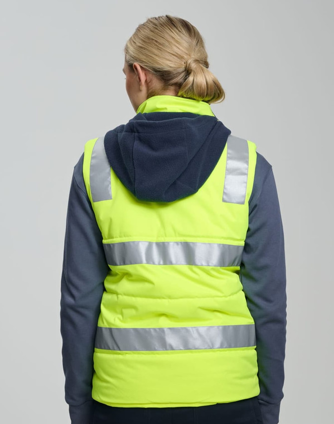 A unisex hi-vis hooded puffer vest in bright yellow with reflective strips and a navy blue hood.