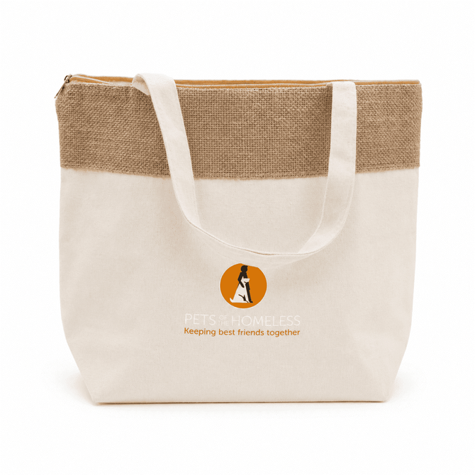 A jute and cotton cooler bag in cream and tan with a logo on the front, featuring sturdy handles.