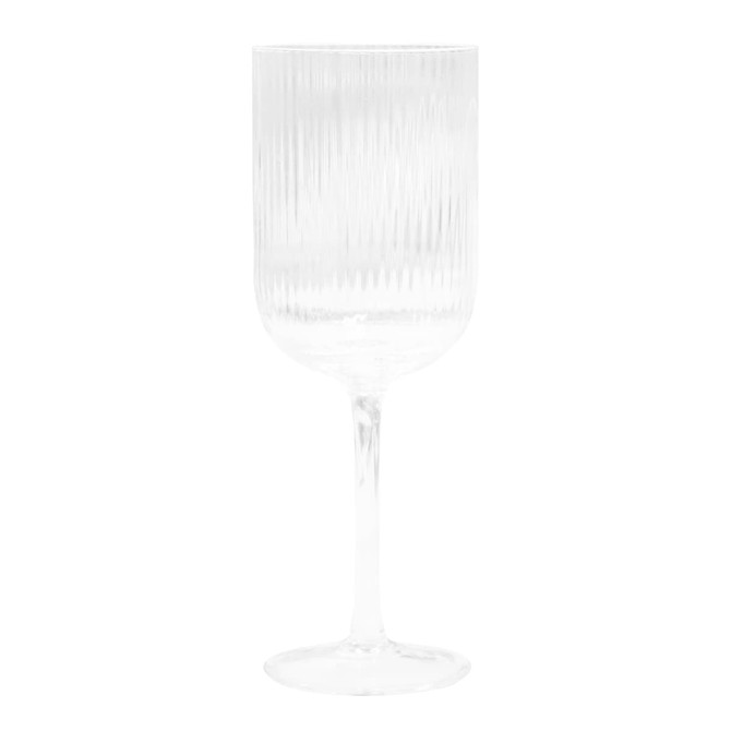 A ribbed clear glass wine glass with a stylish fluted design, standing on a thin stem.