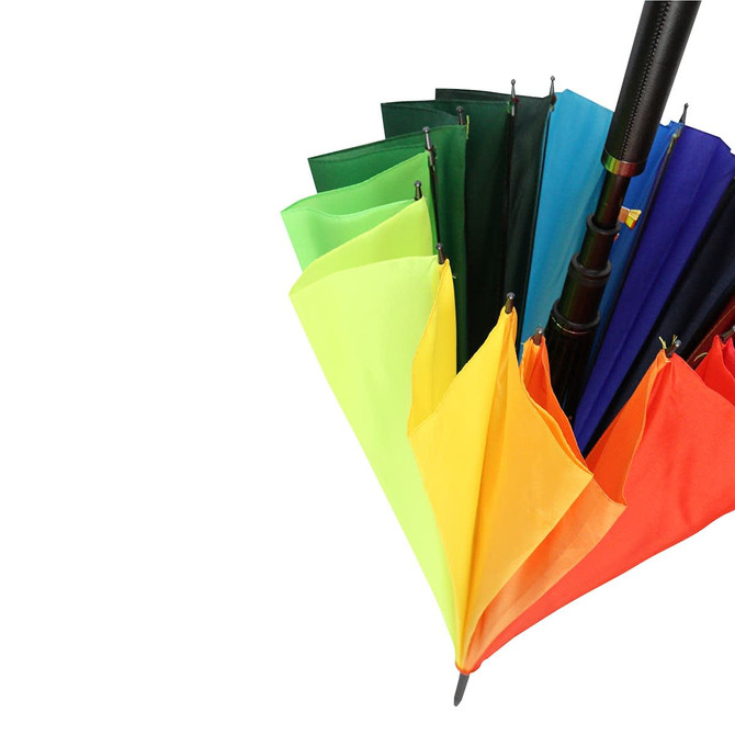 A collection of Iris Umbrellas in various colours, including green, yellow, orange, blue, and red, grouped together.