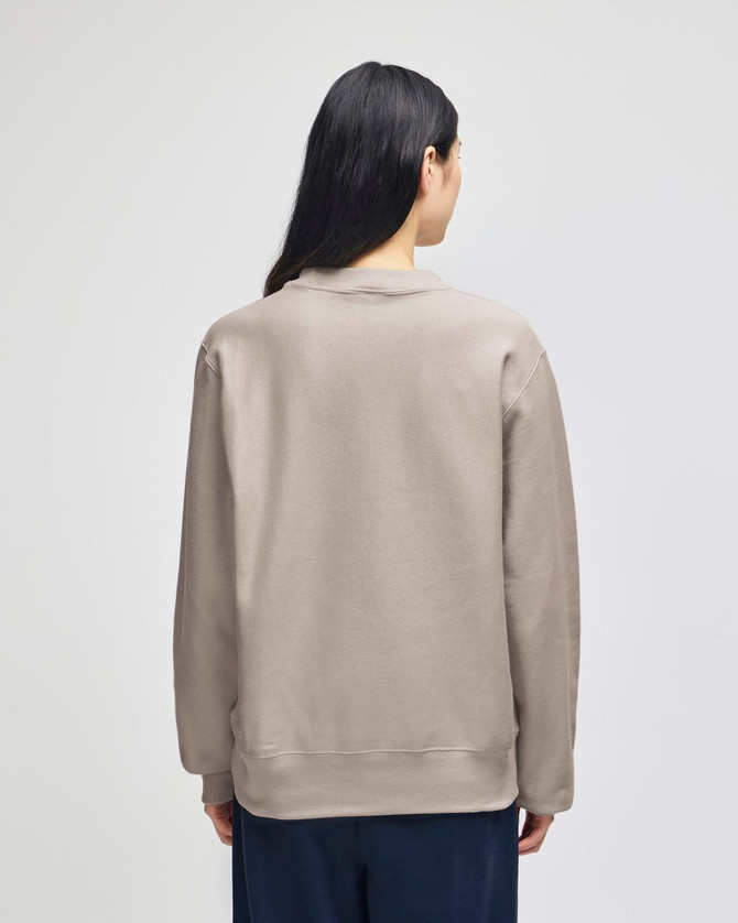 A grey adult crew sweatshirt with a casual fit, featuring a simple design and a logo on the back.