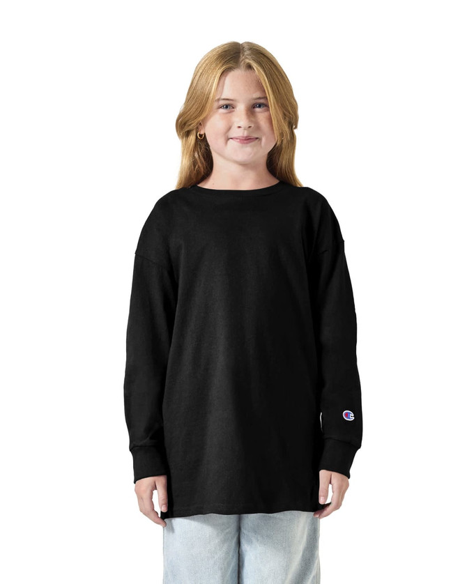 A black long sleeve t-shirt for youth, featuring a logo on the sleeve and a relaxed fit.