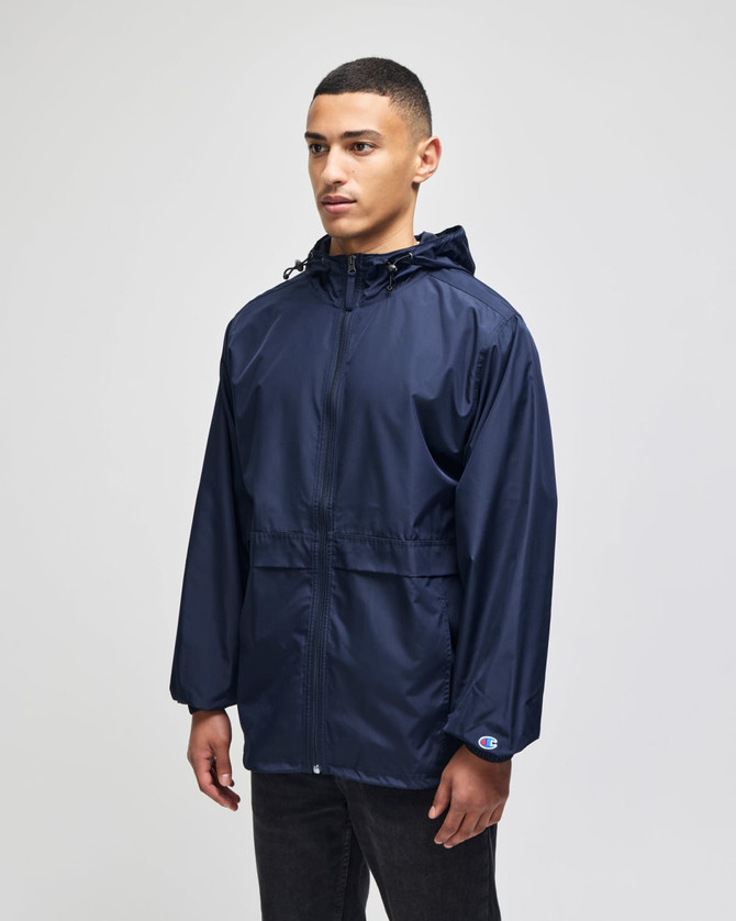 A full-zip anorak jacket in navy blue, featuring a hood and a logo on the sleeve.