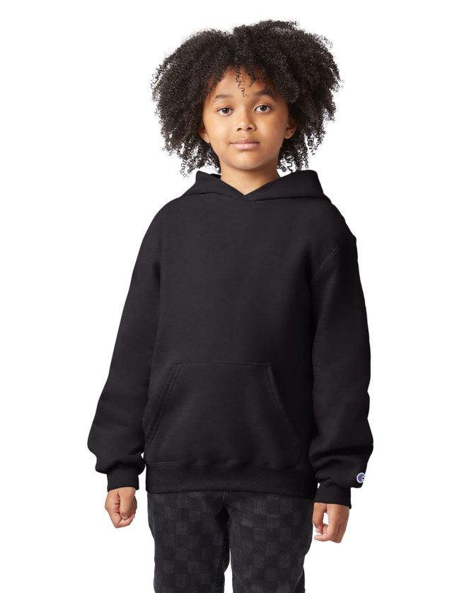 A black hooded sweatshirt with a front pocket, featuring a logo on the sleeve. The model has curly hair.