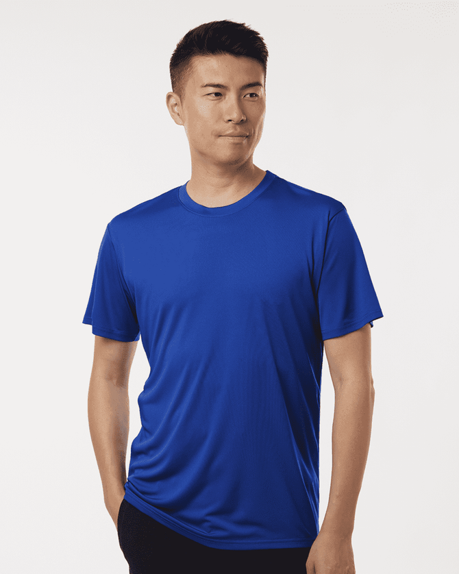 A blue men's performance t-shirt is displayed on a model, featuring a simple design and a branded logo.