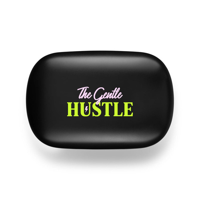 A black promotional product with a vibrant logo featuring the words "The Gentle Hustle" in pink and green.