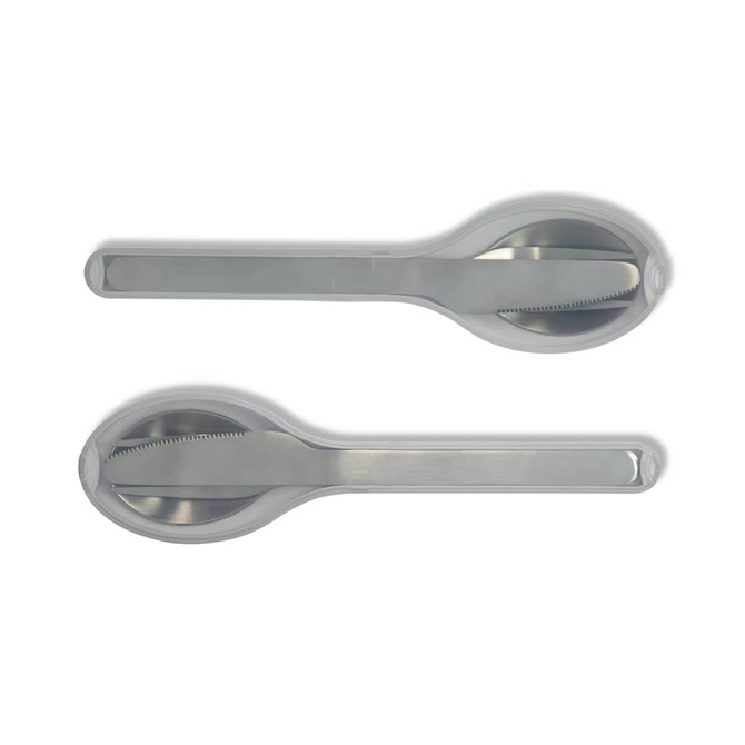 A cutlery set with stainless steel utensils, featuring a knife, fork, and spoon, stored in a sleek, transparent case.