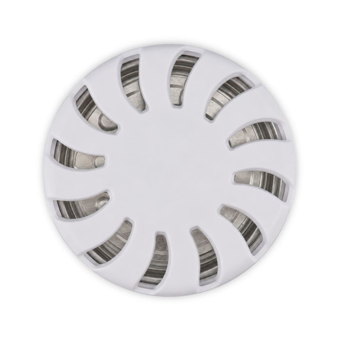 A white fragrance pot with a circular design featuring slits for scent dispersion. It has a metallic base inside.