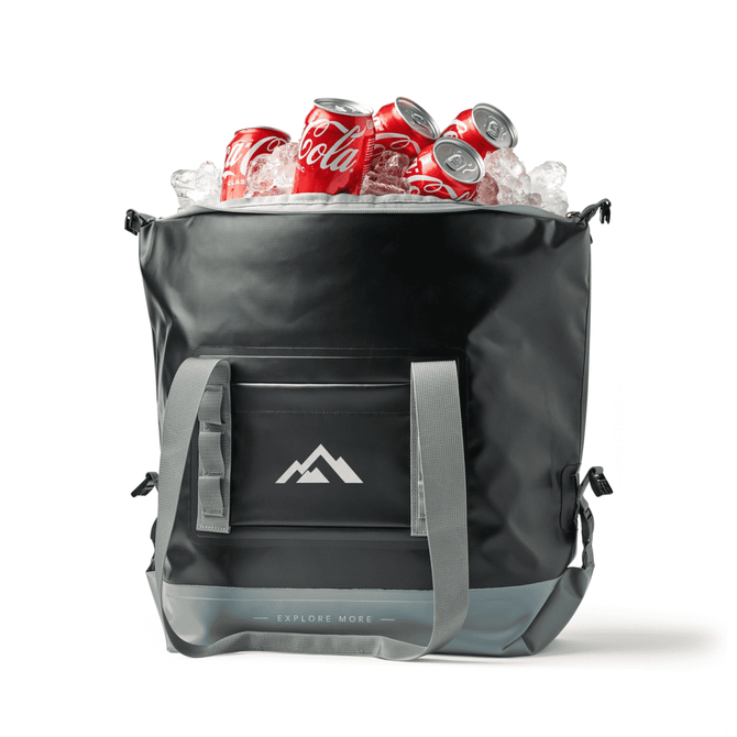 A black foldable cooler filled with ice and cans of Coca-Cola, featuring grey straps and a logo on the front.