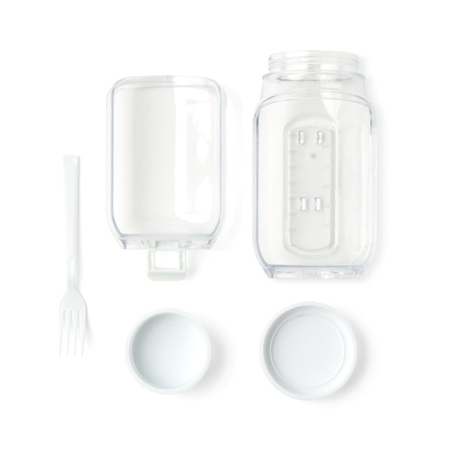 A clear plastic salad jar with a separate container, a fork, and two white lids.