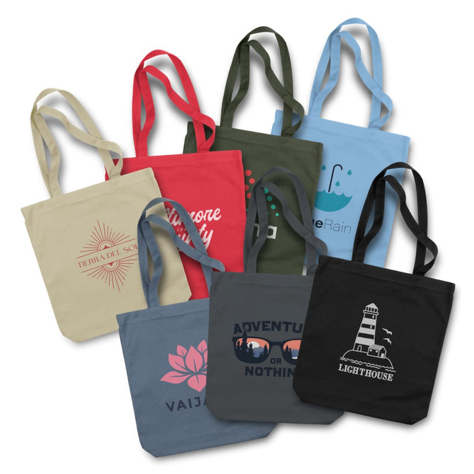 A collection of canvas tote bags in various colours, featuring different designs and logos.