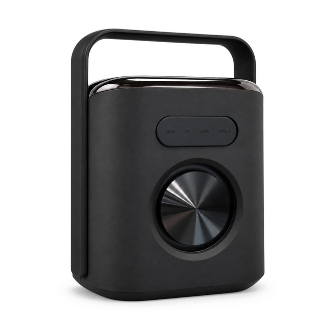 A black Hudson Bluetooth speaker with a rounded handle and a large central dial for volume control.