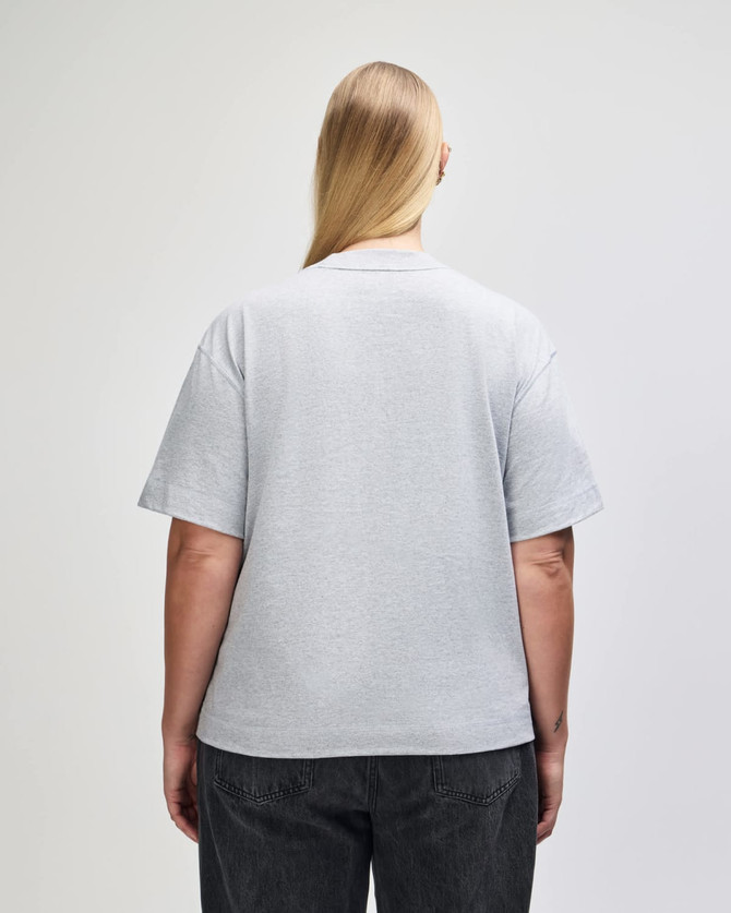 A grey unisex boxy T-shirt displayed from the back, featuring short sleeves and a relaxed fit.