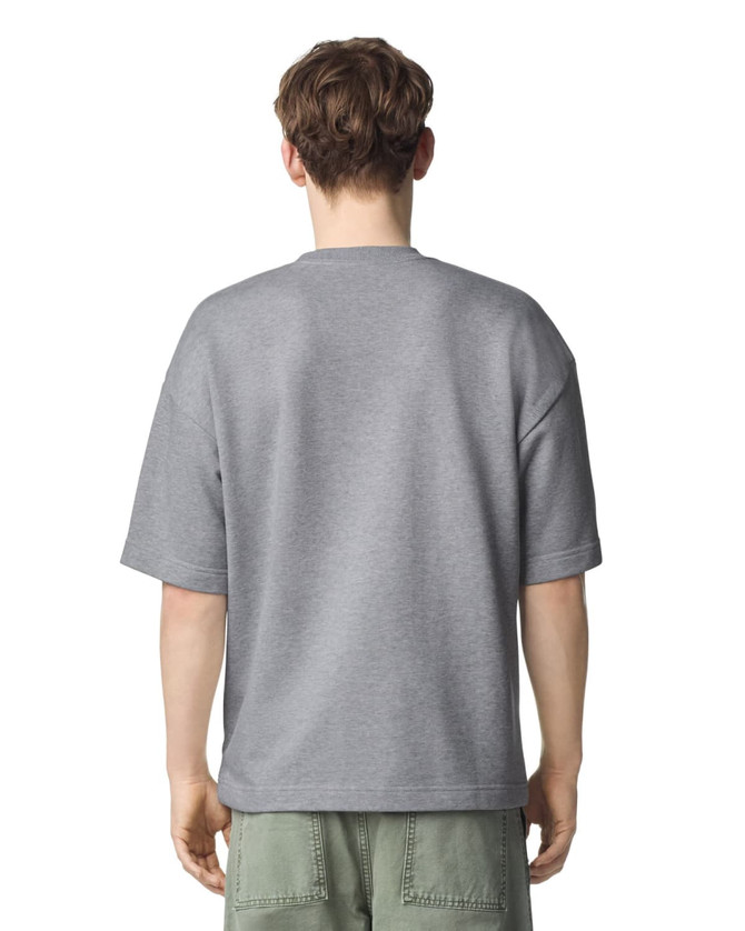 A grey oversized unisex boxy top from American Apparel, featuring a simple design and short sleeves.