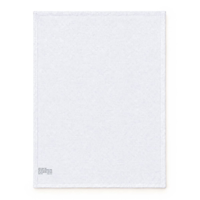 A large white cotton tea towel with a logo on one corner. The fabric appears soft and absorbent.