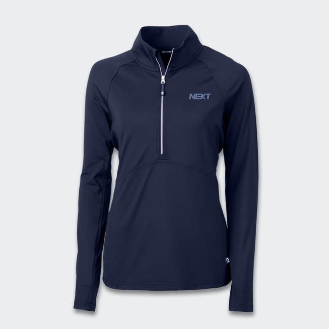 A navy half-zip women's jacket with long sleeves, featuring a small logo on the chest.