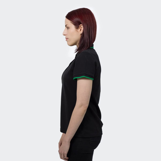 A black women's polo shirt with green detailing along the collar and sleeves. It features a logo on the chest.