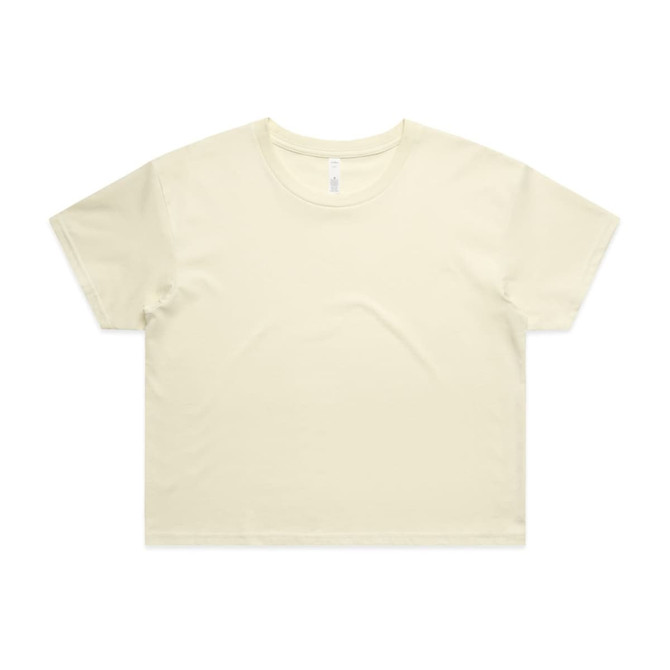 A cropped t-shirt in a soft cream colour, featuring short sleeves and a simple design. It has a logo.