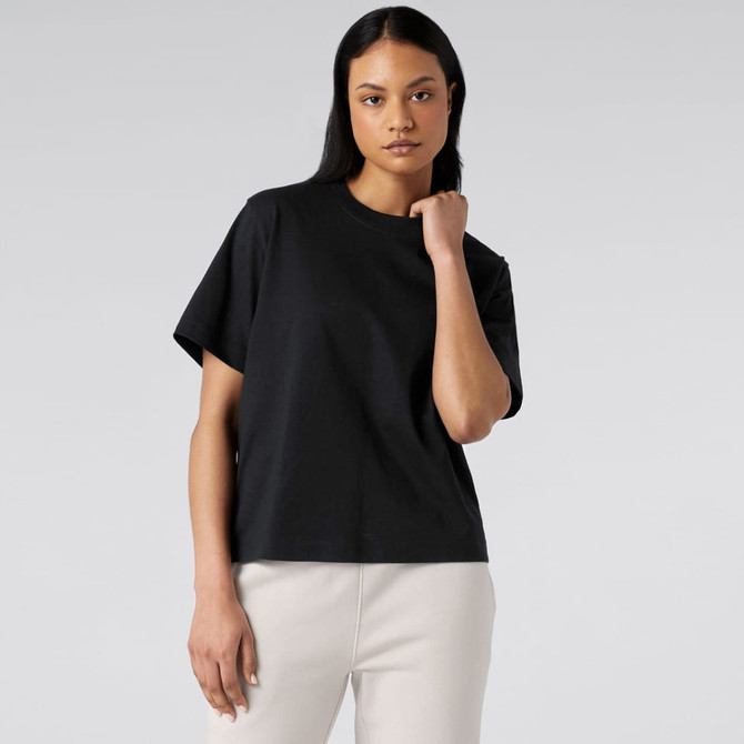 A black short sleeve tee with a relaxed fit, featuring a simple design and a slight sheen.