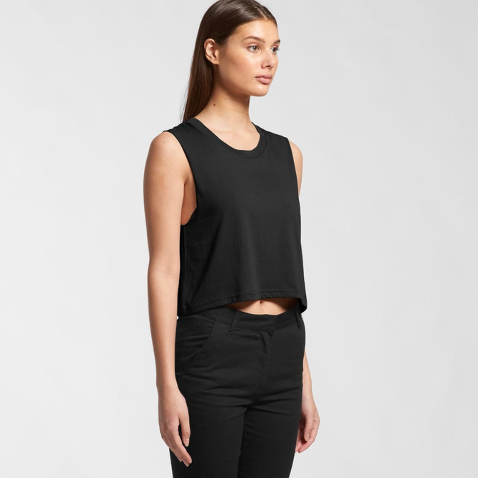 A black crop tank top with a sleeveless design, displayed on a model. The top features a crew neckline and relaxed fit.