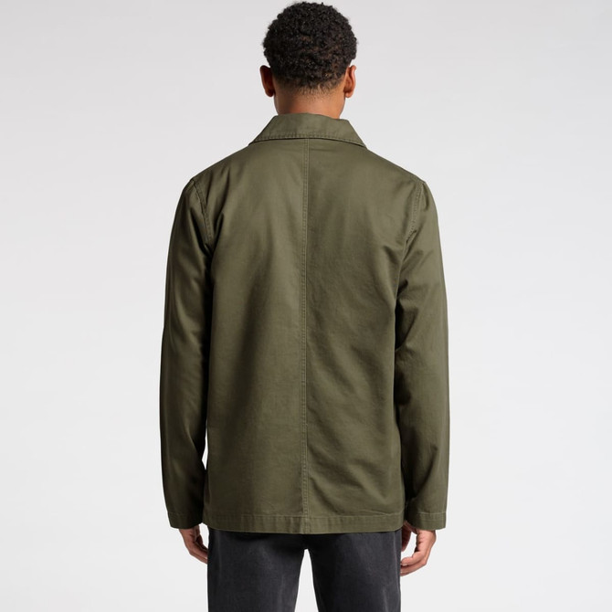 A green Chore Jacket featuring a simple design, view from the back, with a visible logo on the fabric.