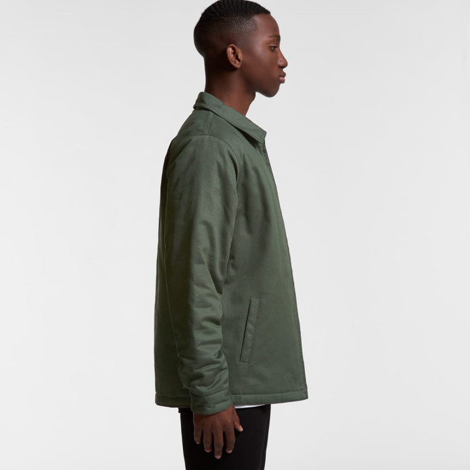A green service jacket shown from the side, featuring a collar and a logo on the chest area.
