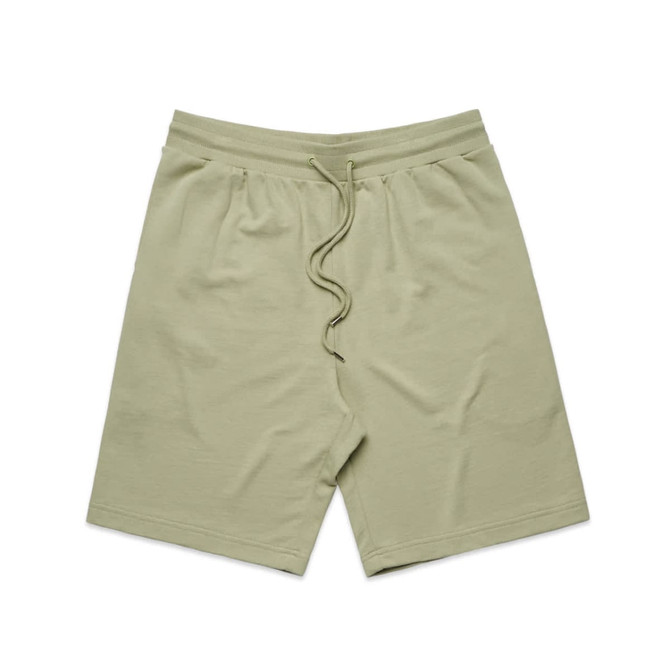 Light green sports shorts with an elastic waistband and drawstring, featuring a logo.