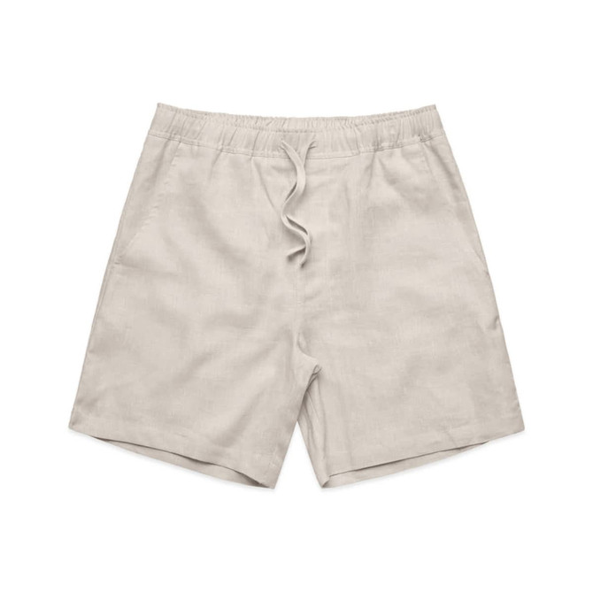 Linen shorts in a light beige colour with an elastic waistband and drawstring. Features side pockets.
