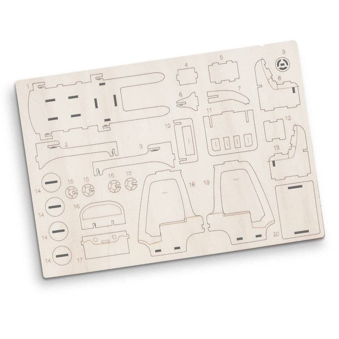 A wooden model puzzle featuring various pieces for assembling a forklift. The pieces are light in colour, arranged on a flat board.