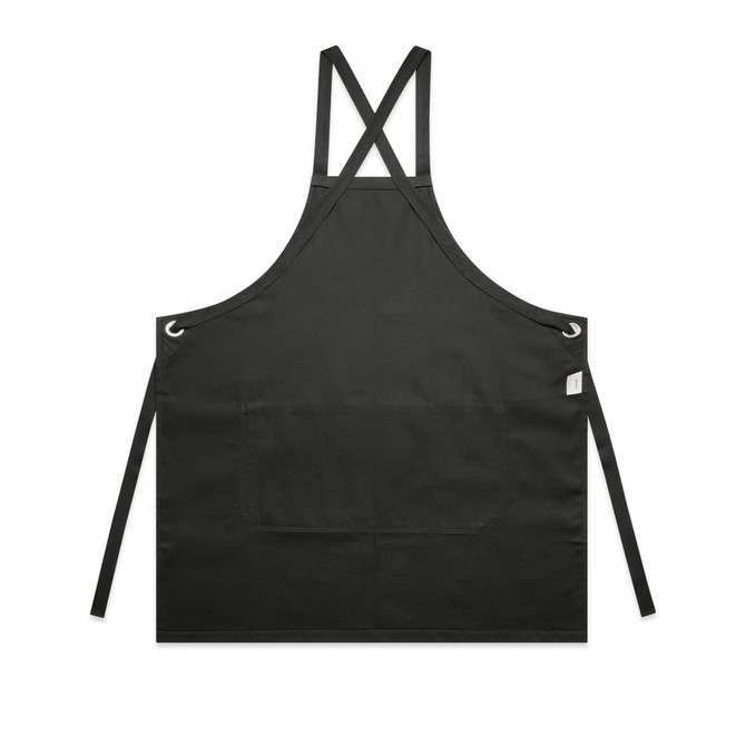A black apron featuring cross-back straps and a front pocket, with eyelet detailing and branding.