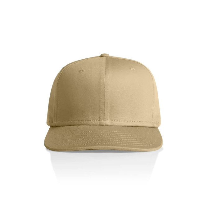 A tan flex cap with a structured front, featuring ventilation holes and a flat brim, along with a logo on the front.