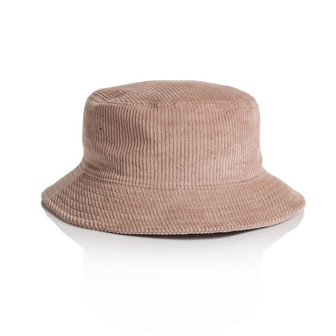 A cord bucket hat in a soft pink hue with a wide brim and a textured surface. It features a logo.