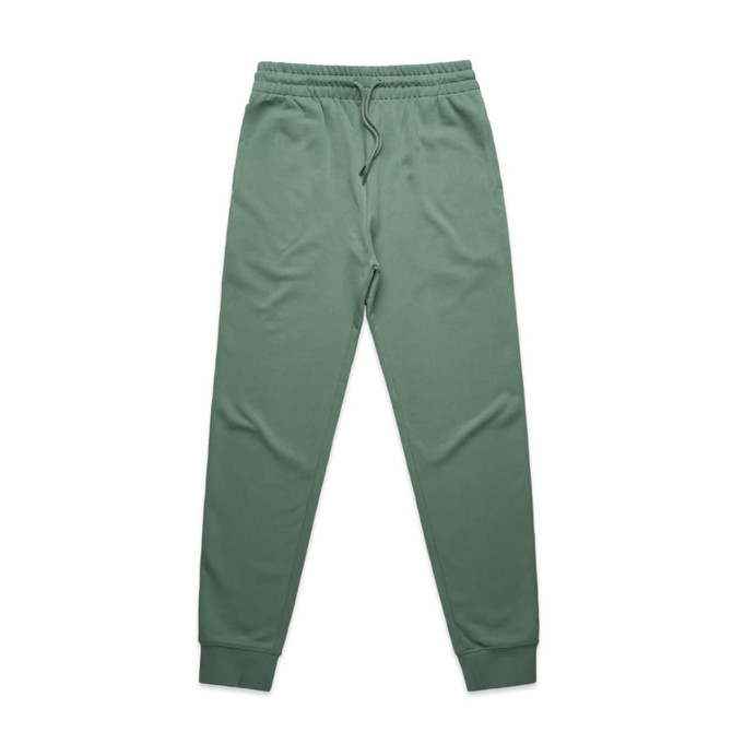 Green track pants made of soft fabric with an elastic waistband and ankle cuffs, featuring a logo.