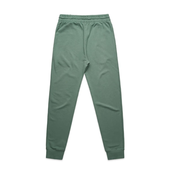 A pair of green premium track pants with an elastic waistband and ribbed cuffs. The pants have a logo.