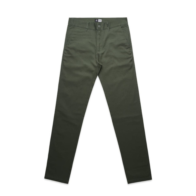 A pair of green slacks featuring a logo on the waistband, laid flat.
