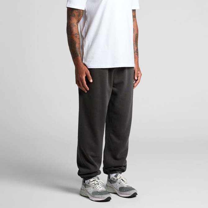 Relax Faded Track Pants in dark grey. Comfortable, tapered design with an elastic waistband and a logo.