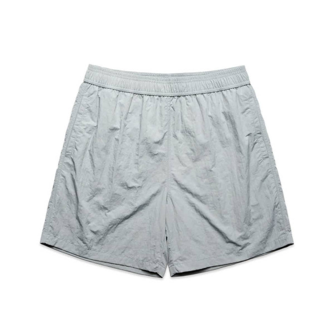 Light grey swim shorts featuring an elastic waistband and a simple design. Includes a logo.