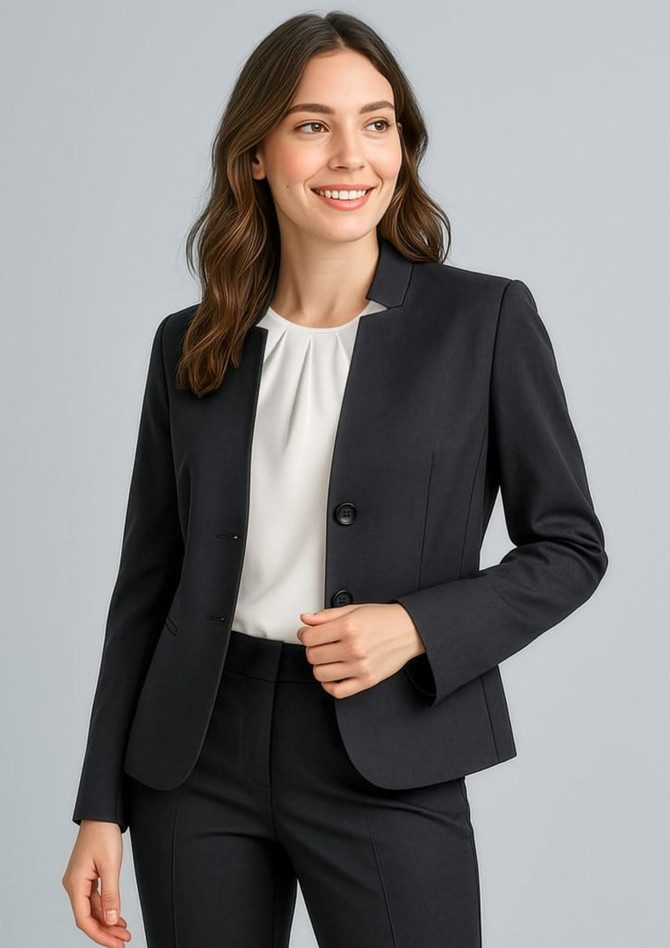 A navy women's cool stretch short jacket with reverse lapel, featuring two buttons and styled with a white top.
