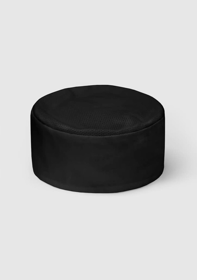 A black flat top hat with a mesh design, featuring a rounded shape and a branded logo.