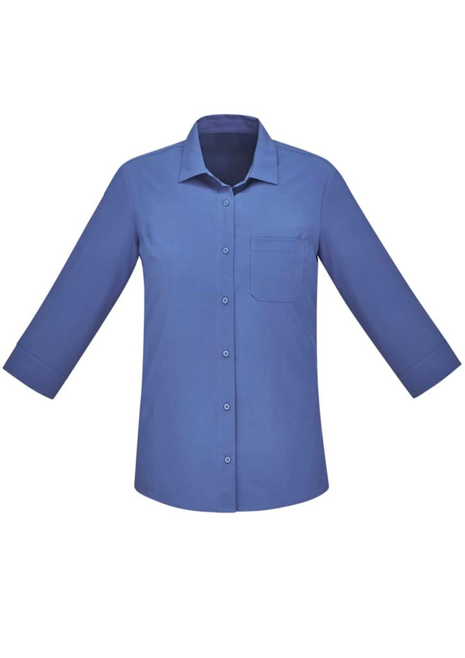 A blue women's button-up shirt with 3/4 sleeves and a chest pocket, featuring a logo.