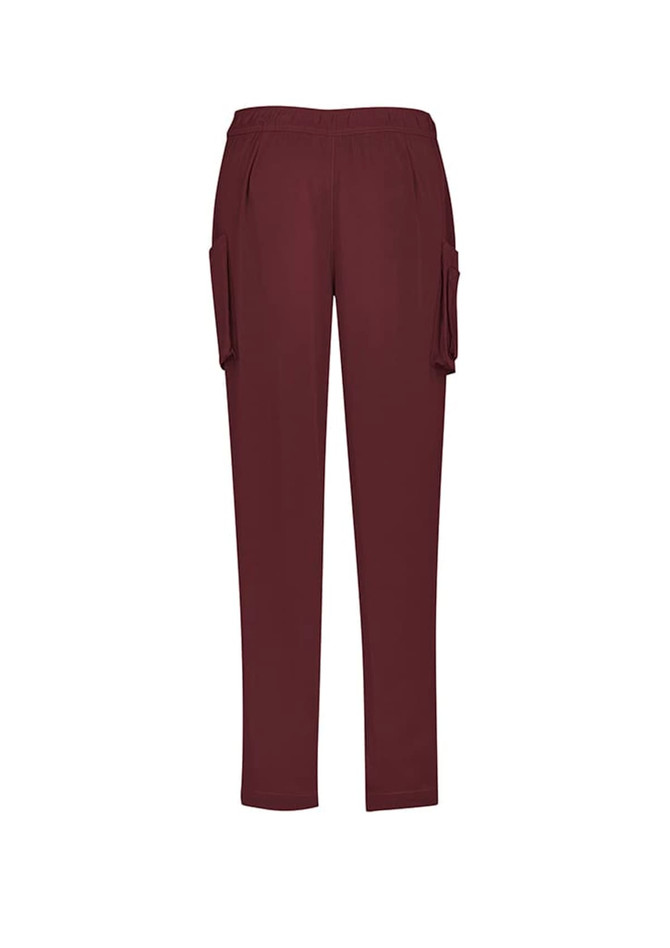 A pair of women's slim leg scrub pants in burgundy, featuring side pockets and an elastic waistband.