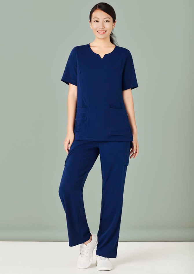 A pair of women's straight leg scrub pants in navy blue, featuring pockets, paired with a matching top.