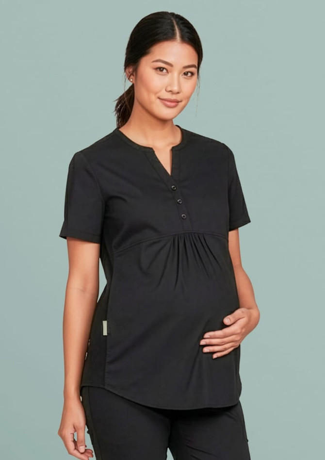 A black tunic scrub top with a button detail and side gathering, designed for pregnant women.